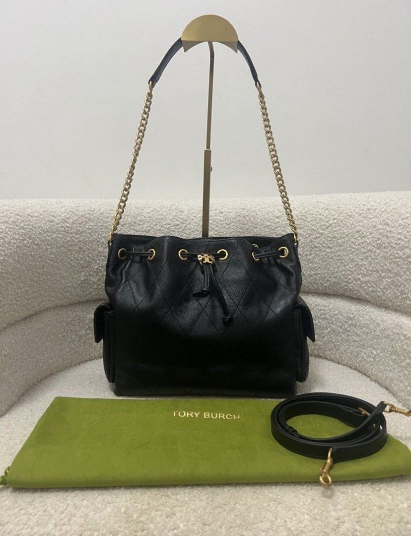 Tory Burch Charlie Drawstring Bag Black (Category: Luxury Bags & Wallets) located in Manila. Submitted by glendamae16 (Listing ID 1459320635, Image 3). Description: - Authentic Tory Burch black leather bucket bag - Elegant diamond quilting all over - Chic gold chain strap - Secure drawstring closure - Convenient side pockets - Comes with original dust bag - Includes an extra strap for versatility - Ideal for everyday style and practicality.