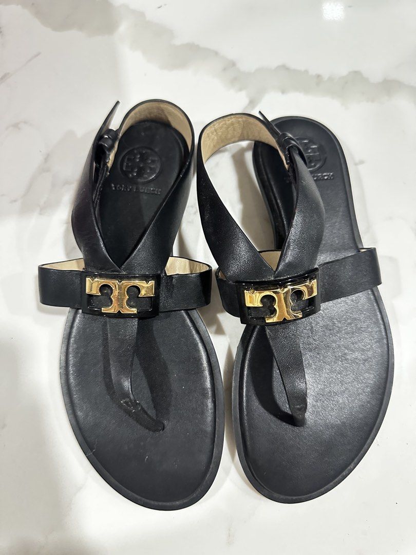 TORY BURCH Flat Sandal- Calf Leather (Category: Flats & Sandals) located in Angeles City. Submitted by claudinelaz (Listing ID 1459357062, Image 1). Description: onhand/mint condition - brand: tory buch - ₱4,500 a original price(SRP) 15k - size: US 5 W - original box included - used less than 5x (like new) - RFS: too small on me & decluttering - mop 🧾: gcash/ bank transfer (payo) - mod 🚚: j&t or lbc dm me to claim! dm for more photos!.
