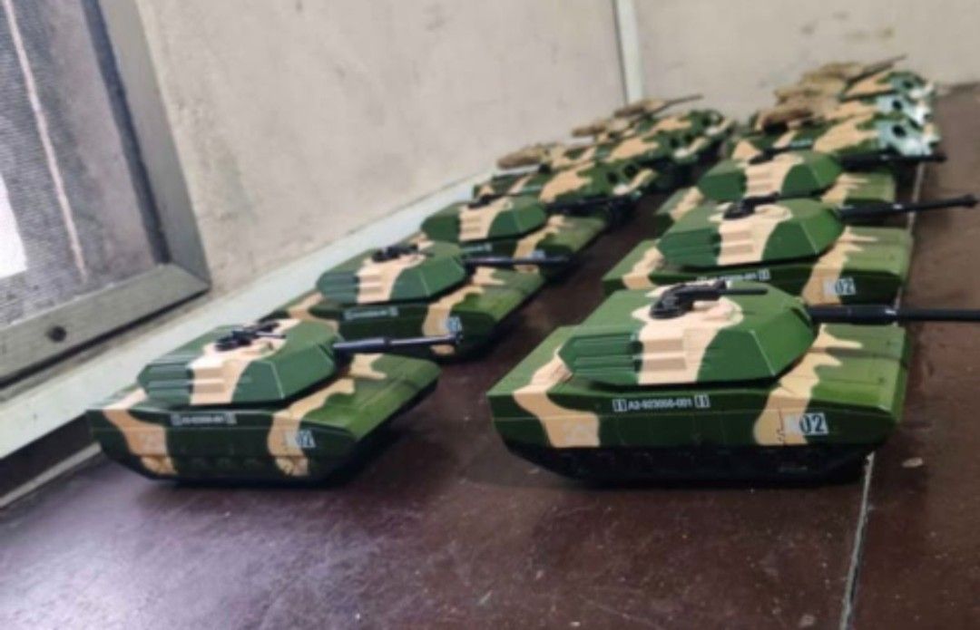 Toy Tanks and apc (Category: Vehicle & Diecast Models) located in Manila. Submitted by balangjhon51268 (Listing ID 1459327771, Image 1). Description: - camoflouge tank and apc - 1/64 scale - tank 6 pieces - apc 6 pieces with diy movable turrwt - tanks 800 - apc 900 - 1,500 pesos take all.