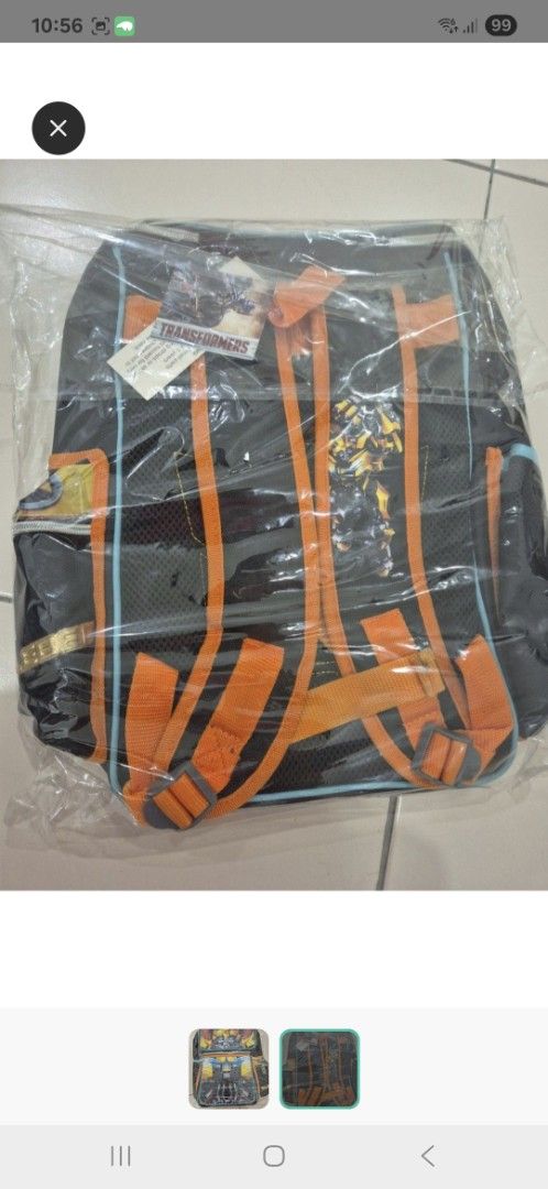 Transformers Bumblebee Backpack (Category: Backpacks) located in Cheras. Submitted by clover8803 (Listing ID 1459314935, Image 2). Description: - Officially licensed Transformers backpack featuring Bumblebee - Spacious main compartment for books and essentials - Convenient front zip pocket for smaller items - Comfortable orange straps for easy carrying - Ideal for school, travel, or everyday use toddler 3yo and above COD bandar tun hussein onn po