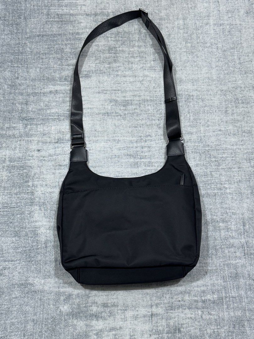 Tumi - Voyageur Sutton - Crossbody Shoulder Bag (Category: Sling Bags) located in Manila. Submitted by members-only (Listing ID 1459355382, Image 3). Description: Tumi Voyageur Sutton 12.75" Nylon Crossbody Shoulder Bag - Black with Silver Hardware Multiple compartments In great condition No major flaws Issue: Missing Tumi Accessory and Leather puller zipper. (check last 2 pics) No holes and scratches in nylon and leather Presentable .