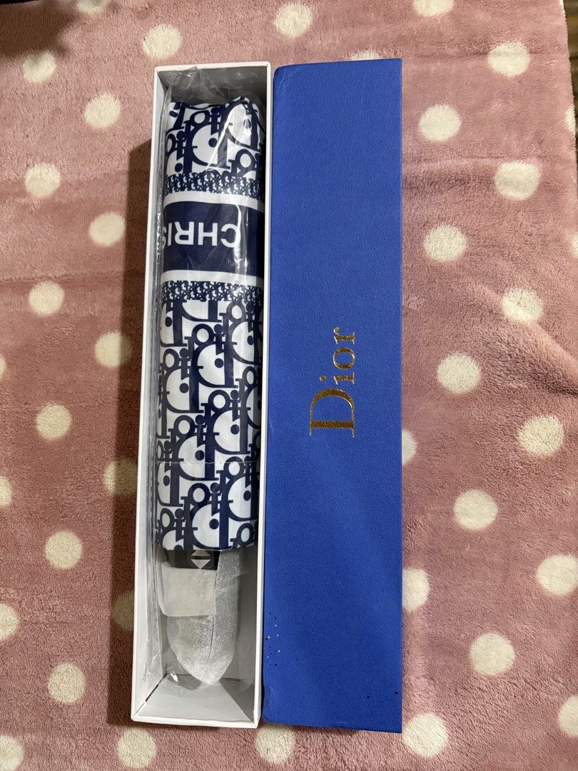 Umbrella (Category: Other Accessories) located in Pototan. Submitted by tres_190725 (Listing ID 1459459226, Image 3). Description: - High-quality umbrellas with luxury brand-inspired designs. - Available designs: Gucci, Loewe, Goyard, Burberry, Dior, Louis Vuitton. - Each umbrella comes in a stylish, branded gift box. - Perfect for staying dry in style. - Great as a gift for fashion-conscious friends..