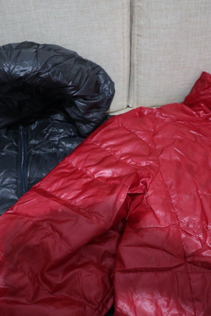 Uniqlo Kids Down Jacket Red & Black Size 150 (Category: Babies & Kids Fashion) located in Quezon City. Submitted by NiniTheExplorer (Listing ID 1459340382, Image 2). Description: - Two Uniqlo Kids Down Jackets - Colors: 1 Red, 1 Black - Size: 150 (fits most kids) - Material: Lightweight and warm down - Origin: Made in China - Versatile: Great for layering or wearing alone - Ideal for cooler weather ₱800 each.