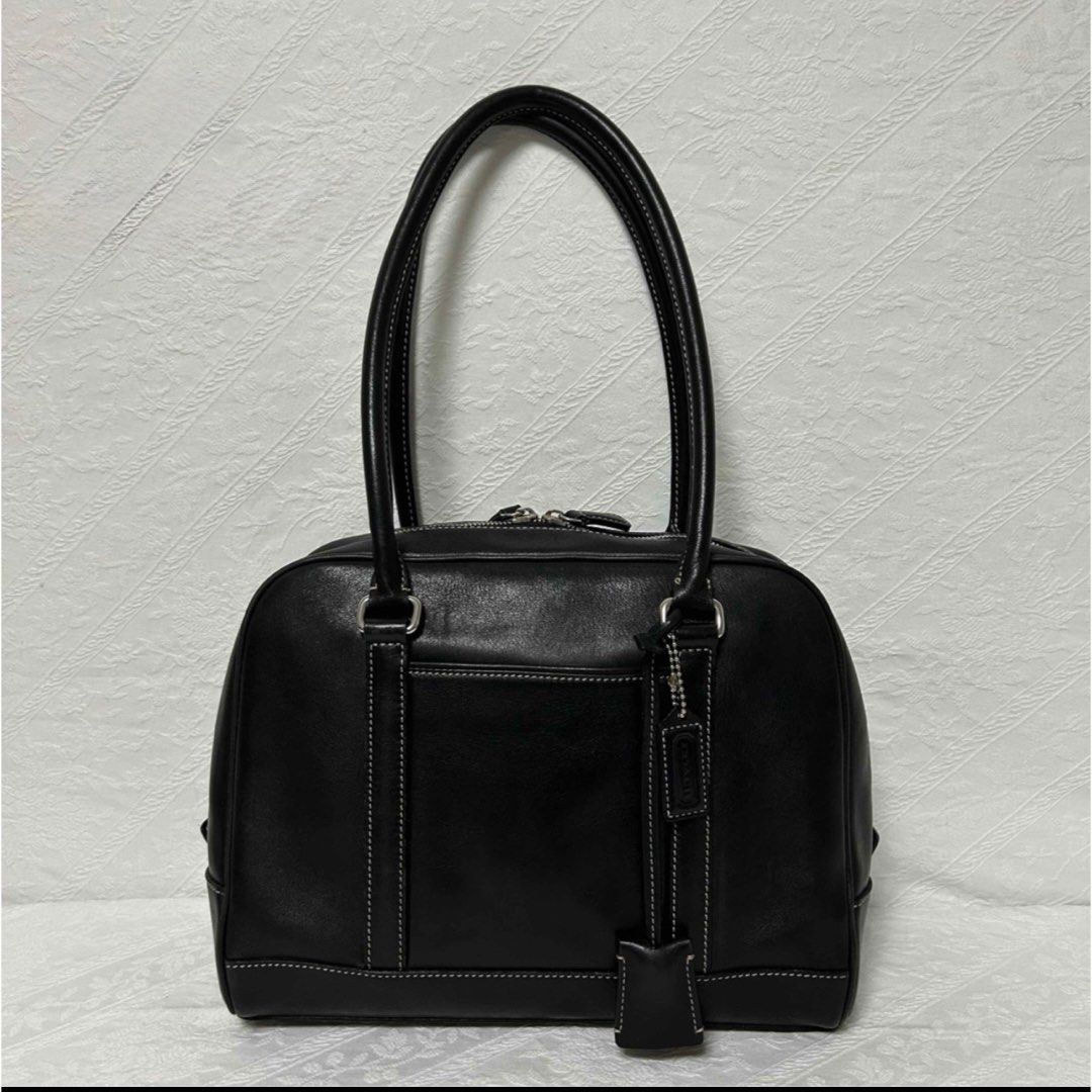 Vintage Coach 7786 (Category: Luxury Bags & Wallets) located in Pasig City. Submitted by chihiro224 (Listing ID 1459458565, Image 1). Description: Vintage Coach 7786 - bought from japan - vintage from the early 2000s - other charms not included, just the coach bag tag - this looks almost new! the leather is very shiny - i also have the camel color (sold) - last price already rfs : declutter #coach #vintage.
