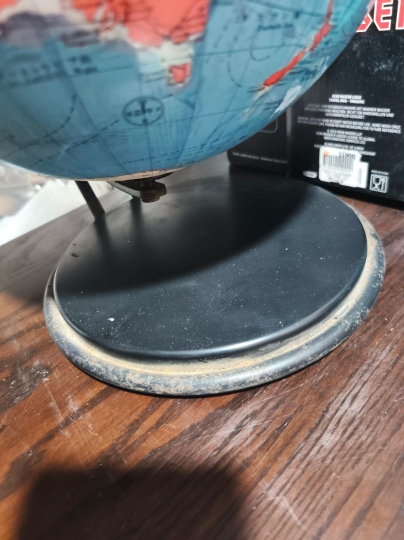 Vintage Educational Globe with Stand (Category: Vintage Collectibles) located in San Leonardo. Submitted by burgossanleonardo.12345 (Listing ID 1459436047, Image 3). Description: - Educational globe showing countries and continents - Mounted on a sturdy black stand - Ideal for learning or decorative purposes - Features Asia, Australia, Africa, and parts of Europe - Stand shows some signs of wear - Approximately 14 inches in height.