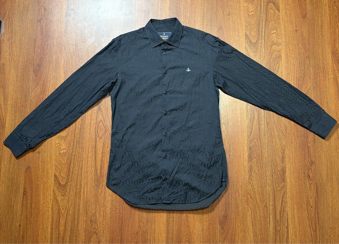 VIVIENNE WESTWOOD BUTTON UP ORB LONGSLEEVE (Category: Formal Shirts) located in Cavite. Submitted by frankiemnla (Listing ID 1459325572, Image 1). Description: L- 30 W- 22 Size- Med to Large * black * cotton * poplin texture * signature Orb logo embroidery * button-down collar * front button fastening * long sleeves * buttoned cuffs * curved hem .