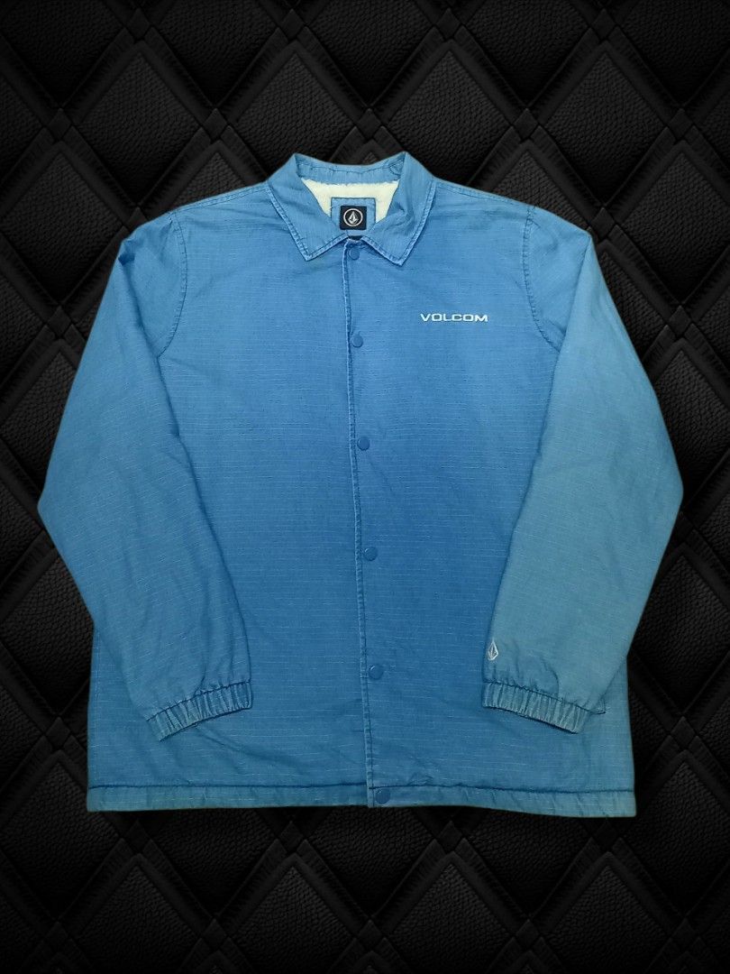 Volcom Blue Sherpa Lined Coach Jacket Size L (Category: Coats, Jackets and Outerwear) located in Aguinaldo. Submitted by baguioukayukay2600 (Listing ID 1459304033, Image 2). Description: - Blue Volcom coach jacket - Sherpa lined for extra warmth - Button up front closure - Two convenient side pockets - Embroidered Volcom logo on chest and sleeve - Size Large - W23xL30.