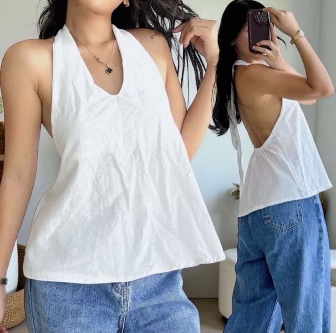 white halter top (Category: Others Tops) located in Quezon City. Submitted by prelovedbychinorobia_ (Listing ID 1459329528, Image 2). Description: stretchy!! can fit to size s-l.