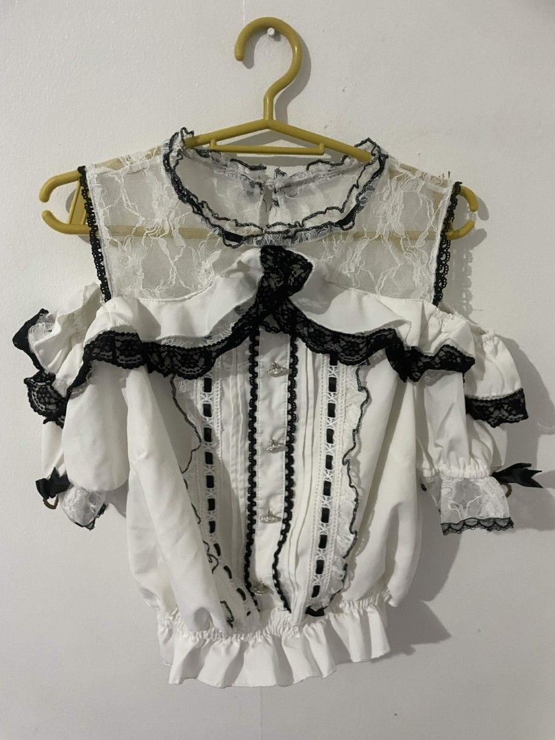 white lace jirai kei Blouse (Category: Blouses) located in Marikina City. Submitted by wontyoukissme (Listing ID 1459461358, Image 1). Description: white & black blouse - from 🍊 app - fits L - XL - no brooch included more info: MOP: gcash MOD: j&t or lalamove .