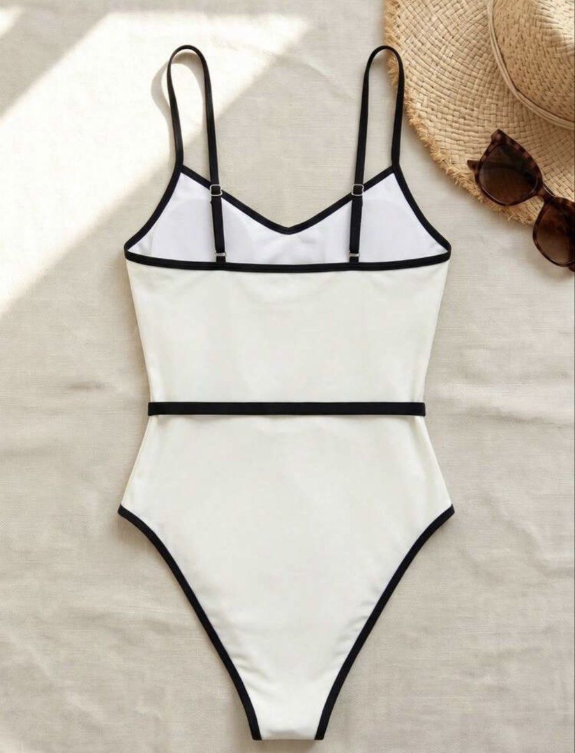 White One-Piece Swimsuit with Belt (Category: Bikinis & Swimsuits) located in Quezon City. Submitted by wuppinn (Listing ID 1459437667, Image 3). Description: •Brand new; never used, never washed •Hygienic liner still attached •Can replace padding •RFS: wrong size •Bought for ₱ 1,300.