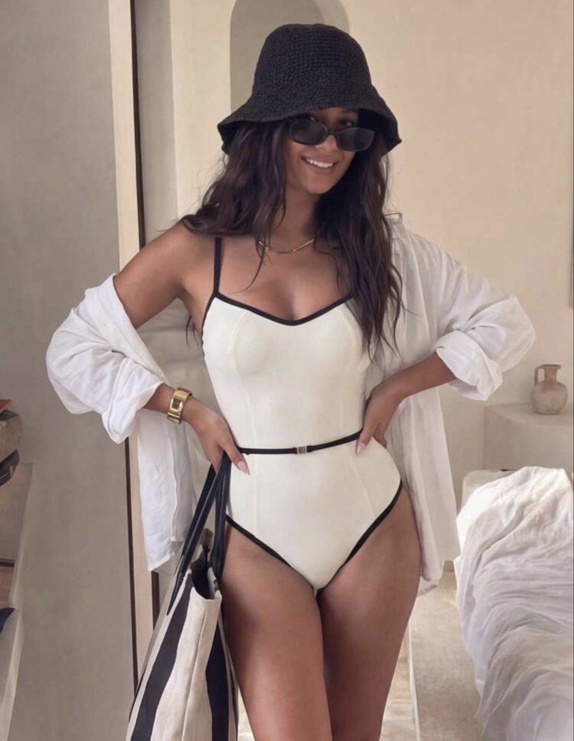 White One-Piece Swimsuit with Belt (Category: Bikinis & Swimsuits) located in Quezon City. Submitted by wuppinn (Listing ID 1459437667, Image 2). Description: •Brand new; never used, never washed •Hygienic liner still attached •Can replace padding •RFS: wrong size •Bought for ₱ 1,300.