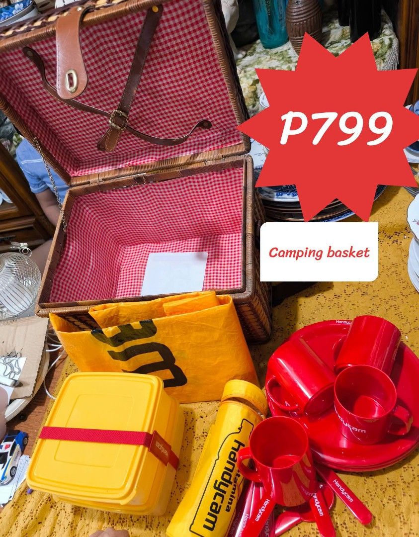 Wicker Picnic Basket with Red Gingham Lining and Accessories (Category: Food Organization & Storage) located in Quezon City. Submitted by louidanny3 (Listing ID 1459330417, Image 1). Description: - Vintage-style wicker picnic basket - Features red gingham lining inside - Includes yellow food containers - Comes with red mugs and plates - Also includes a yellow bag - Ideal for camping and outdoor gatherings - Price: P799.