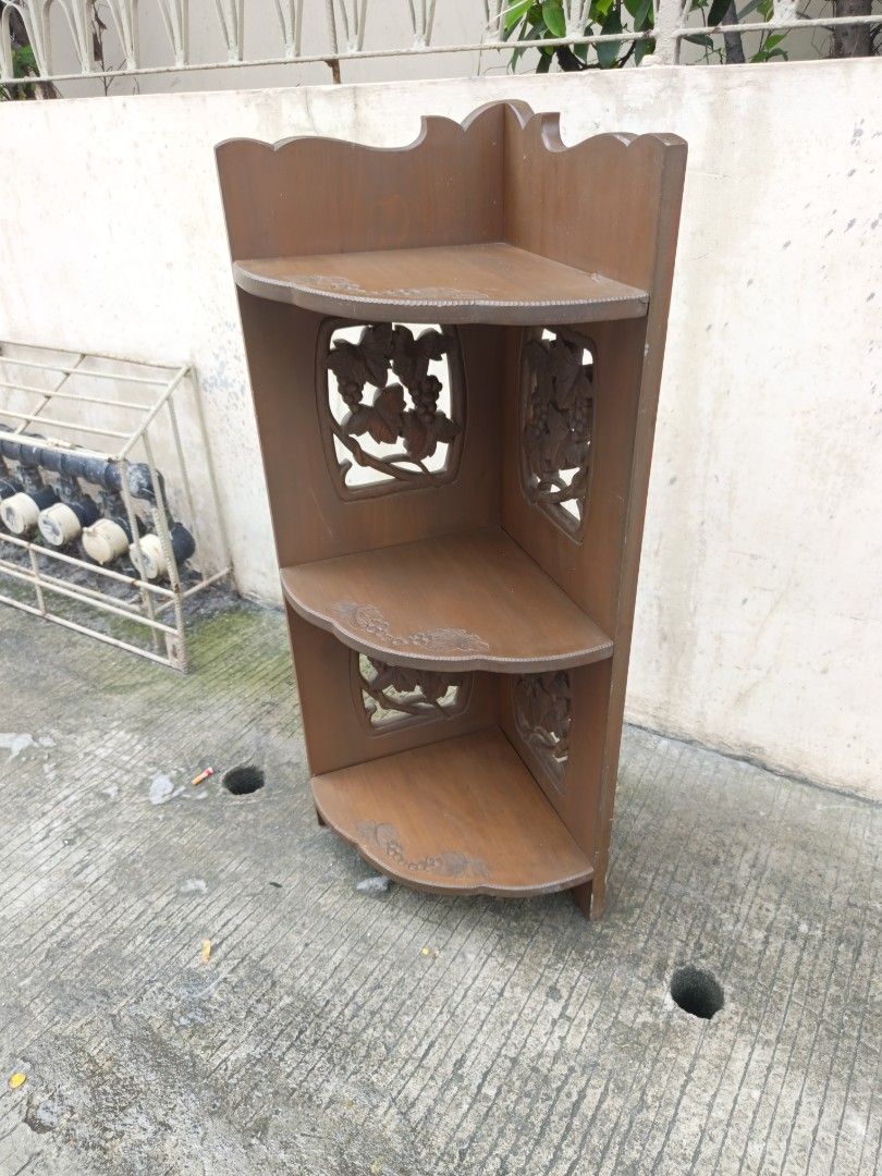 Wooden Corner Shelf with Carved Panels (Category: Shelves, Cabinets & Racks) located in Valenzuela. Submitted by kendra071914 (Listing ID 1458715328, Image 3). Description: - Elegant 3-tier wooden corner shelf - Features intricate floral carvings on panels - Perfect for adding character and style to any corner - Dimensions: Height 94cm, Length 45cm, Width 35cm - Pick up only.