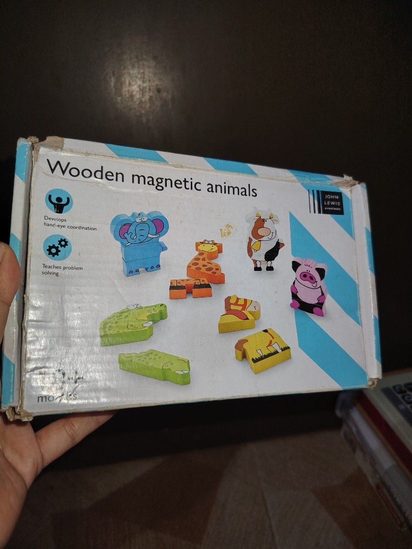 Wooden Magnetic Animals Preloved (Category: Educational & Learning Toys) located in Santiago. Submitted by aceheart0118672 (Listing ID 1459294853, Image 2). Description: - Preloved Wooden Magnetic Animals set - Brand: John Lewis & Partners - Recommended Age: 18+ months - Material: Wood with magnetic backing - Features: Develops hand-eye coordination, Teaches problem solving - Includes: Cow, Alligator, Giraffe, Horse, Pig, Elephant - Condition: Go