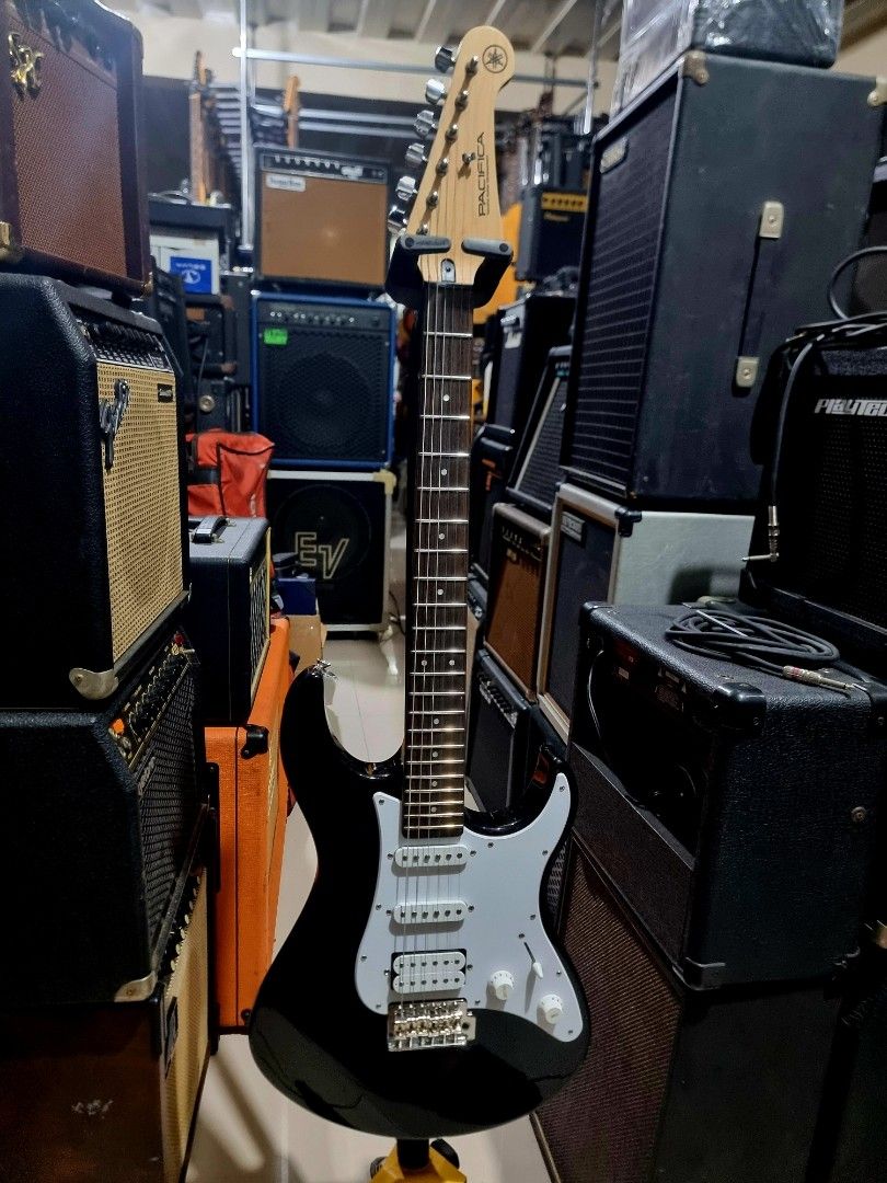 Yamaha Pacifica Electric Guitar - Black (Category: Musical Instruments) located in Binan City. Submitted by jamrock.music (Listing ID 1459442395, Image 1). Description: - Yamaha Pacifica electric guitar - Features a smooth neck and comfortable body - Ready to play right out of the box - A solid and reliable instrument for any guitarist.