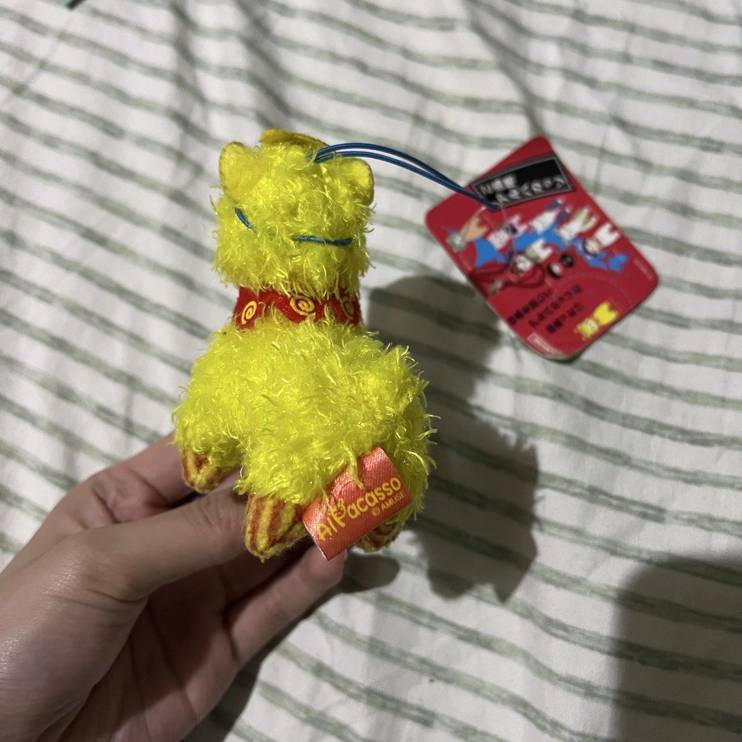 yellow Amuse Alpacasso alpaca plush keychain (Category: Plushies & Soft Toys) located in Manila. Submitted by erickalago (Listing ID 1459454111, Image 2). Description: no issue loc: manila & makati.