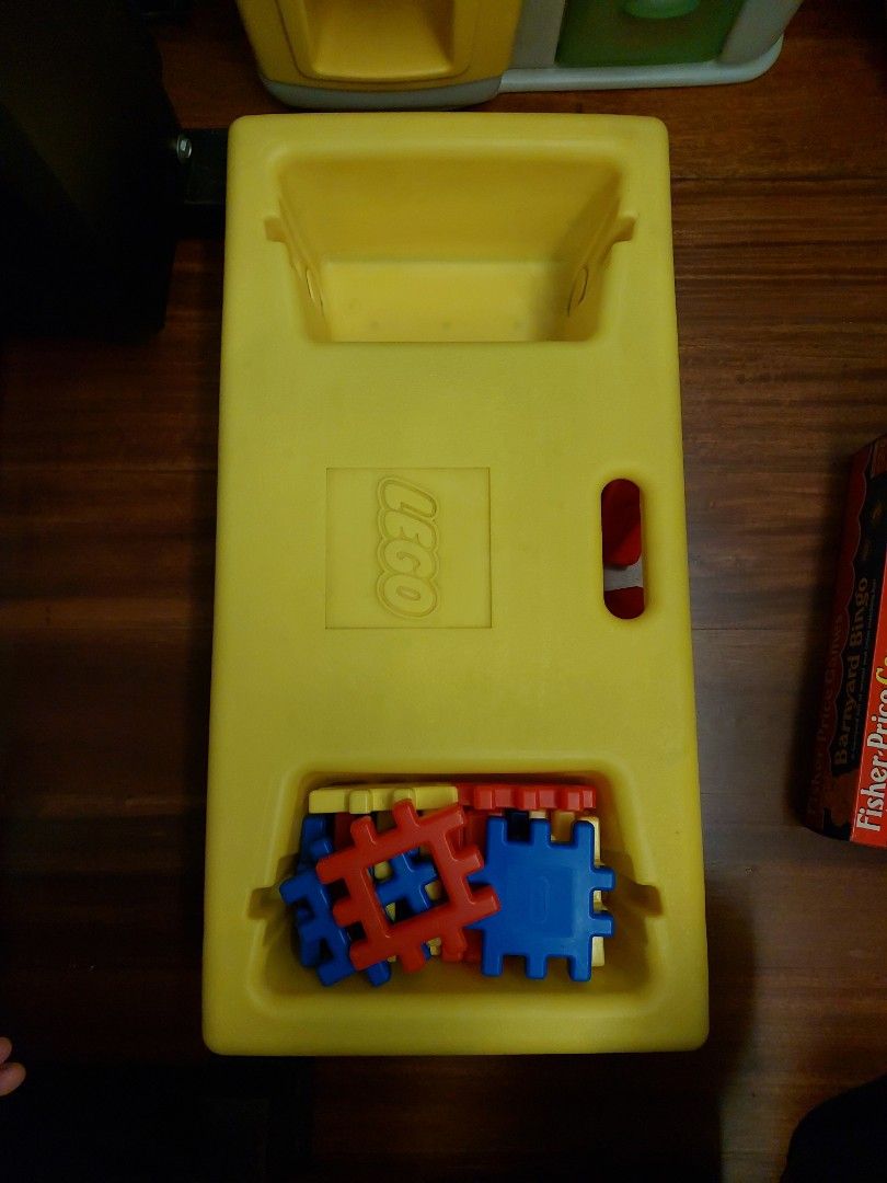 Yellow LEGO Activity Foldable Table with Red and Blue Blocks (Category: Lego & Building Sets) located in Caloocan City. Submitted by ericajane_tc (Listing ID 1459404482, Image 1). Description: - LEGO branded yellow activity table - Built-in compartments for toys and blocks - Comes with red and blue building blocks - Foldable and sturdy red legs - Ideal for fostering creative play - Easy to clean surface.