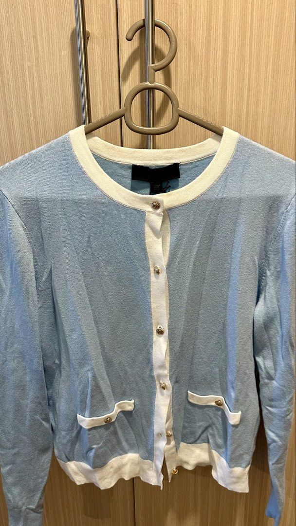 Zara Blue & White Trim Button Up Cardigan (Category: Coats, Jackets and Outerwear) located in Pasig City. Submitted by patchig (Listing ID 1459398998, Image 3). Description: BRAND NEW! Zara Cardigan - light blue with white trim details on neckline, buttons, and pockets - Bought but never used - Still has the tag.