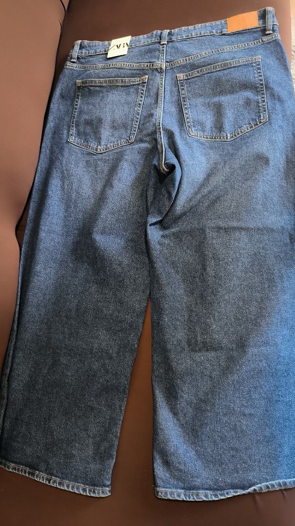 Zara Wide Leg Jeans (Category: Jeans) located in Antipolo. Submitted by secondcharmstore (Listing ID 1430885755, Image 2). Description: sale 400 These Zara wide-leg jeans are a classic addition to any wardrobe. They feature a comfortable fit and a versatile design. The jeans have a button and zipper closure, with front and back pockets. The size is indicated on the tag. Perfect for everyday wear, these jeans offer both style and comfort. waist: 4