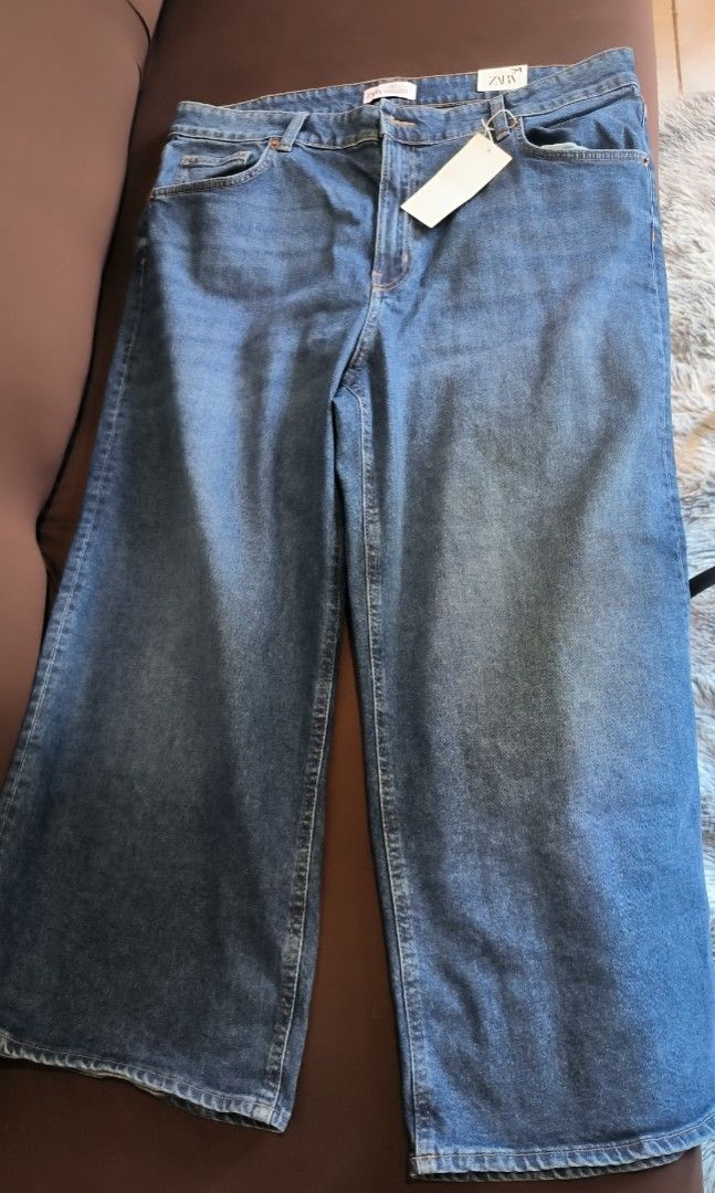 Zara Wide Leg Jeans (Category: Jeans) located in Antipolo. Submitted by secondcharmstore (Listing ID 1430885755, Image 1). Description: sale 400 These Zara wide-leg jeans are a classic addition to any wardrobe. They feature a comfortable fit and a versatile design. The jeans have a button and zipper closure, with front and back pockets. The size is indicated on the tag. Perfect for everyday wear, these jeans offer both style and comfort. waist: 4