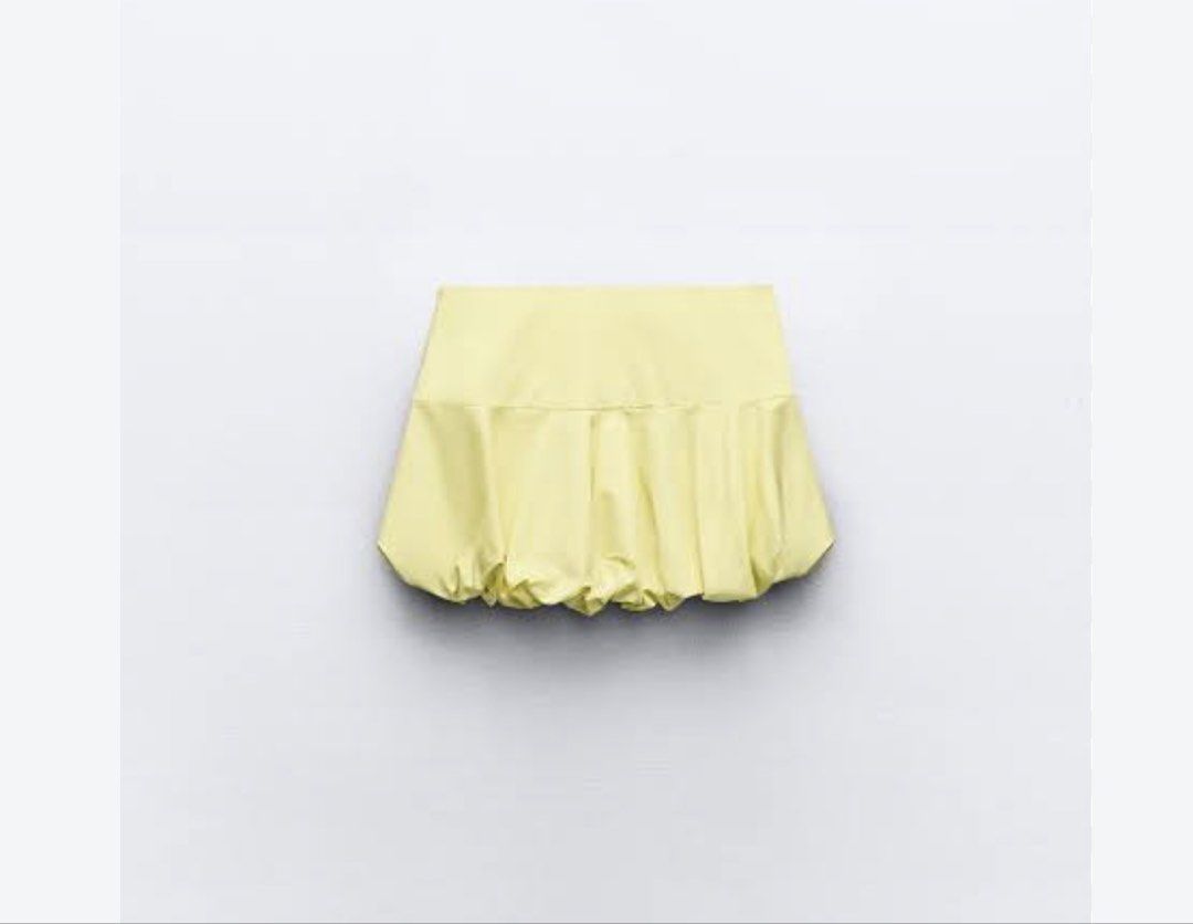 Zara Yellow Bubble Hem Mini Skirt Size M (Category: Skirts) located in Pasig City. Submitted by atbp__ (Listing ID 1459411419, Image 2). Description: - Cute yellow mini skirt from Zara - High-waisted design - Unique gathered bubble hem - Convenient side zipper closure - Ideal for a playful, summery look.