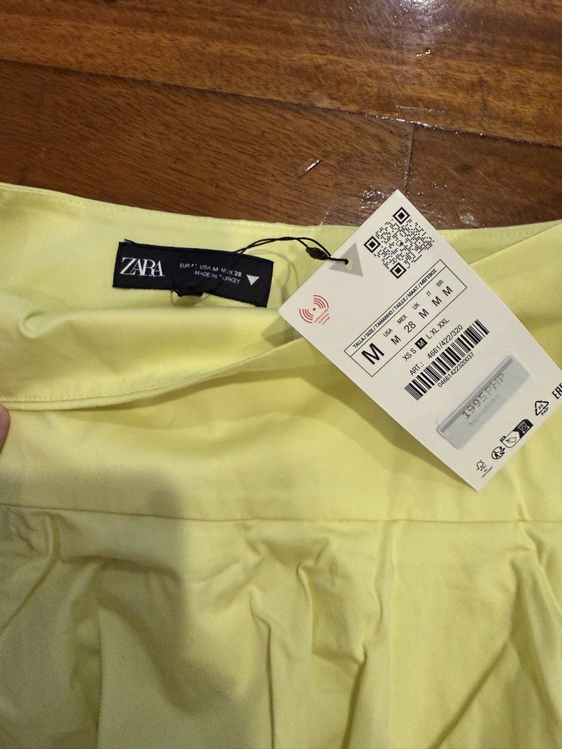 Zara Yellow Bubble Hem Mini Skirt Size M (Category: Skirts) located in Pasig City. Submitted by atbp__ (Listing ID 1459411419, Image 3). Description: - Cute yellow mini skirt from Zara - High-waisted design - Unique gathered bubble hem - Convenient side zipper closure - Ideal for a playful, summery look.
