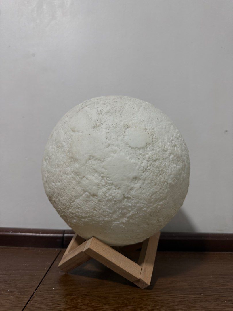 3D Moon Lamp (20 CM) 🌙 (Category: Other Home Appliances) located in Bulacan. Submitted by stevendgzmn (Listing ID 1464970193, Image 2). Description: 🌙 3D Moon Lamp (20 cm) 🌙 💸 Price: ₱400 (Negotiable) Specifications: * Size: 20 cm * Material: PLA * Power: 0.5W * Brightness: Stepless adjustment * Color Temperature: 3000K (Warm White) / 6000K (Cool White) * Battery-operated and rechargeable Features: * 3D-printed design that recreates the moon’