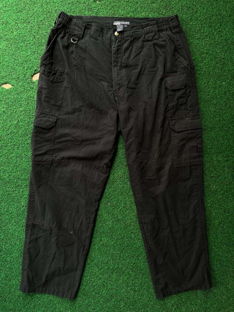 5.11 Tactical Series Black Cargo Pants (Category: Trousers) located in Sibulan. Submitted by bryzsabz (Listing ID 1465062048, Image 2). Description: - Brand: 5.11 Tactical Series - Color: Solid black - Fit: Relaxed fit for maximum comfort and mobility - Durability: Tough fabric construction with reinforced knees and waistband - Storage: Multiple utility pockets on the legs for gear - Features: Button closure, belt loops, and front utility D-ring 