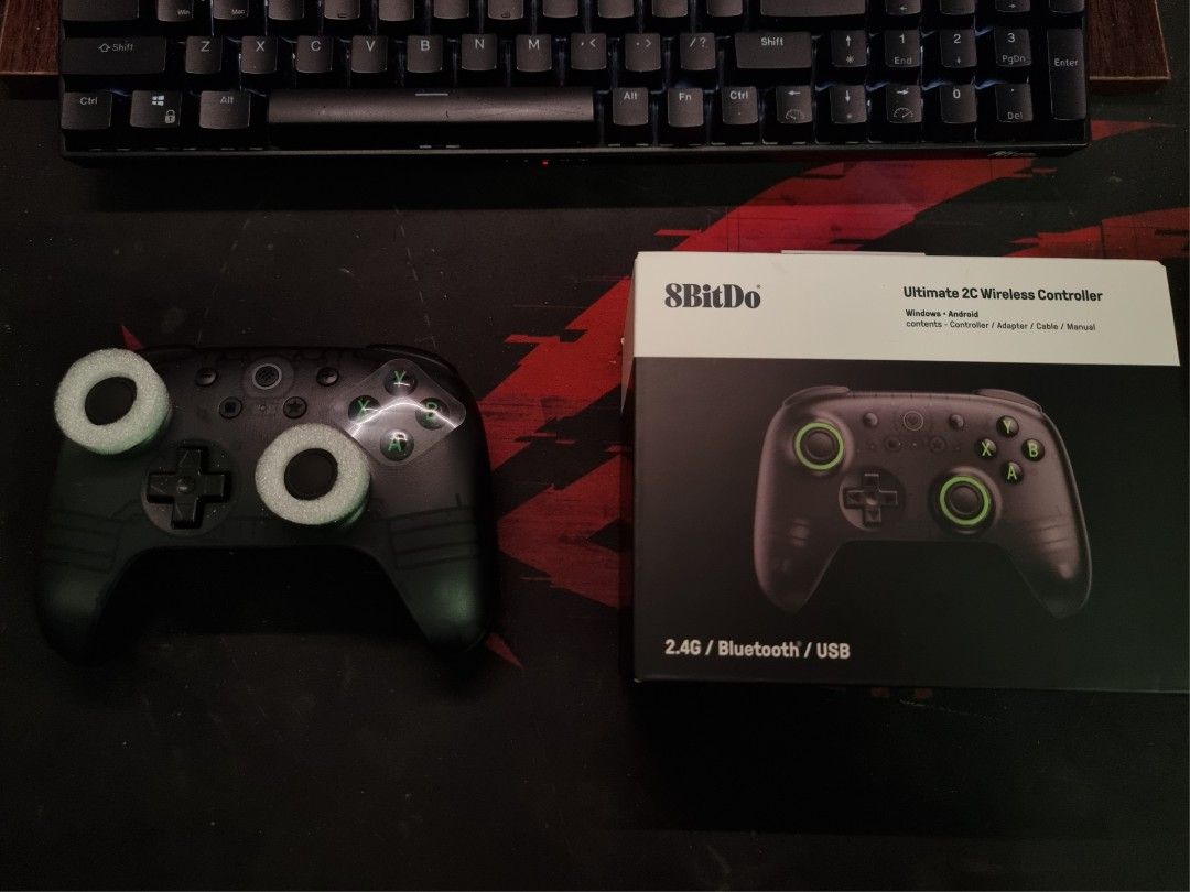 8BitDo Ultimate 2C Wireless Controller (Category: Controllers) located in Kuala Lumpur. Submitted by mizuhashien (Listing ID 1465146232, Image 1). Description: 8BitDo Ultimate 2C Wireless Controller (Black transparent, green) Condition: Brand new, plastic still unpeeled. Purchased on 9/9/26, current RRP at RM87.48. Selling because was not what I expected. I previously owned a Fantech WGP15 EOS Pro (worth RM150), so this felt like a downgrade, so 