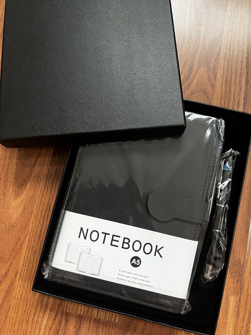 A5 Black Notebook Gift Set with Pen (Category: Stationery & School Supplies) located in Quezon City. Submitted by atozmarketing (Listing ID 1464991939, Image 1). Description: - Brand new, sealed in plastic - Includes A5 notebook and matching pen - Premium 80gsm cream pages, ideal for writing and sketching - Packaged in a sturdy black presentation box with a textured cover - Ready to gift or use.