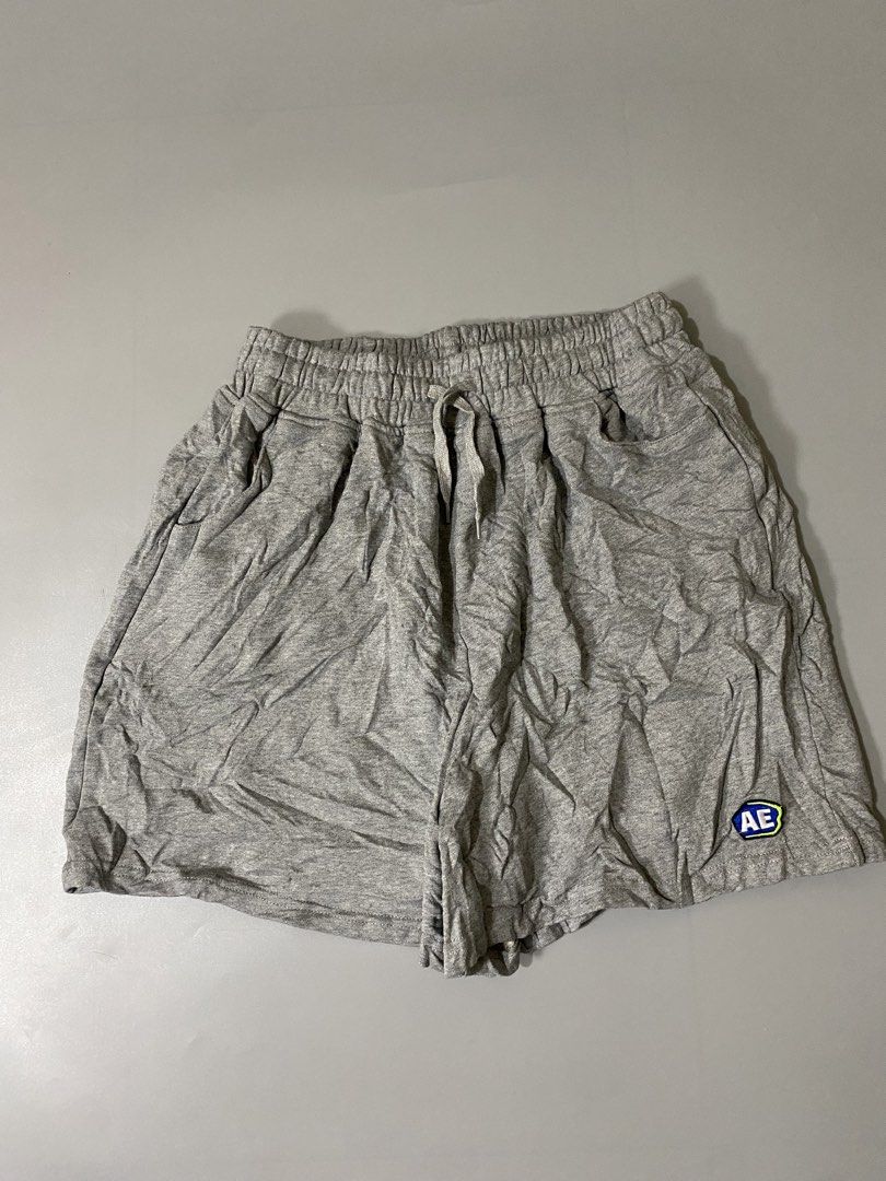ADER Error Grey Sweatshorts with Tags (Category: Shorts) located in Davao. Submitted by brandedthrift.134 (Listing ID 1465086011, Image 3). Description: - Brand new with original store tags - Authentic ADER Error grey sweatshorts - Elastic waistband with adjustable drawstring - Embroidered AE logo patch near the hem - Convenient back patch pockets with signature blue branding tab - Soft and comfortable cotton blend material, ideal for casual wear