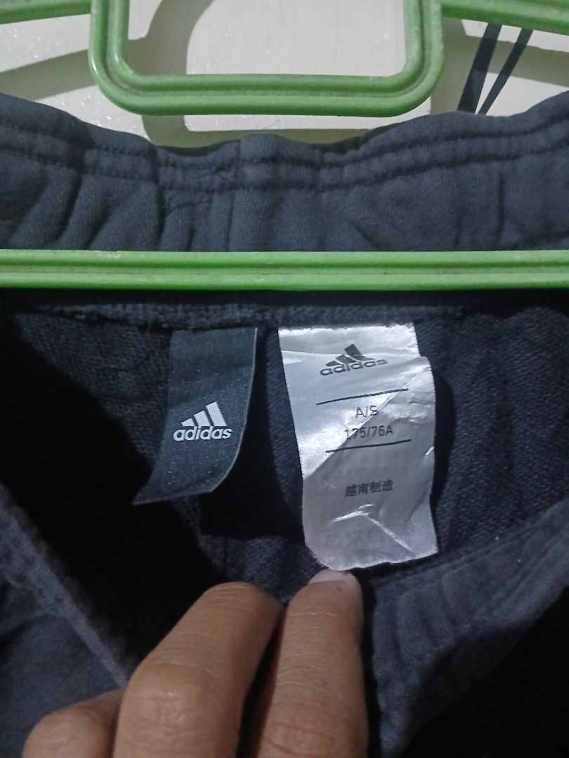 Adidas Black Shorts with White Stripes (Category: Shorts) located in Caloocan City. Submitted by vincefresn21903 (Listing ID 1464993448, Image 3). Description: - Brand: Adidas - Color: Black with classic white side stripes and printed logo - Size: A/S (175/76A) - Waistband: Elastic for a comfortable fit - Condition/Use: Great for workouts, gym sessions, or casual lounging at home - Fast shipping available, PM to order!.