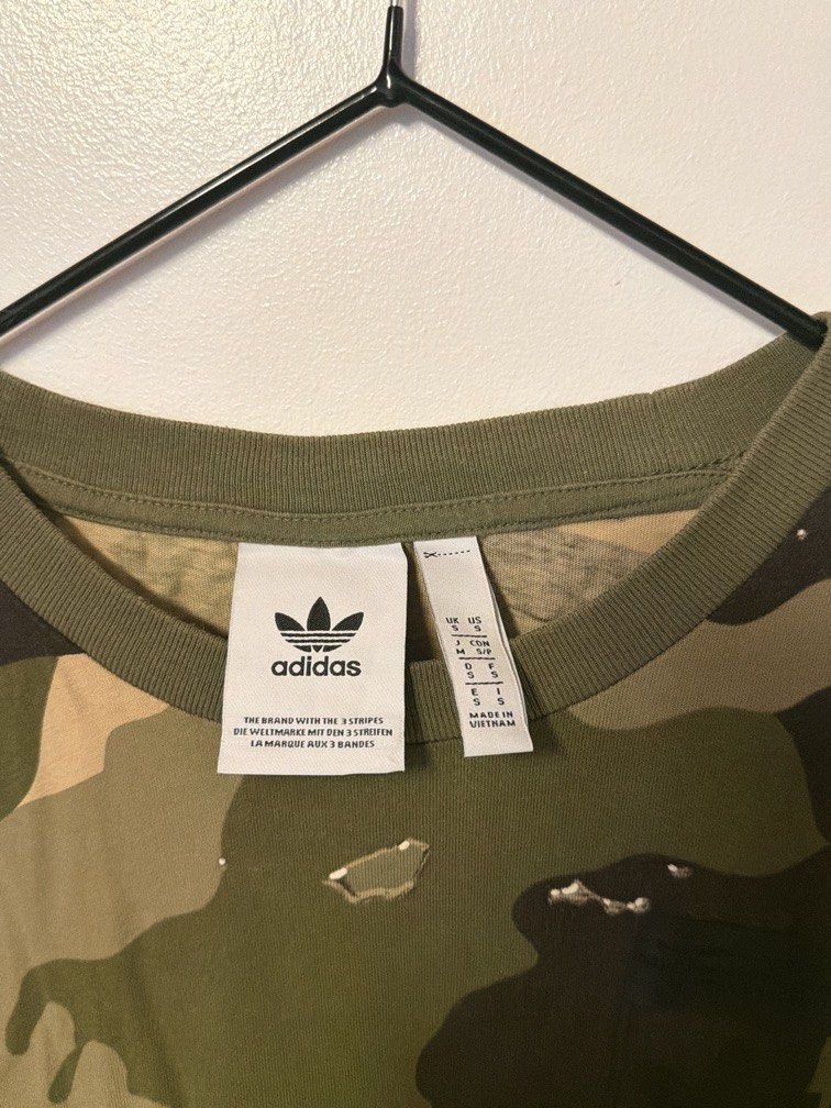 Adidas Camo Top (Category: Others Tops) located in Makati City. Submitted by prelovedandlovedbyt (Listing ID 1465046615, Image 2). Description: Unisex Authentic Can fit XS-MEDIUM.
