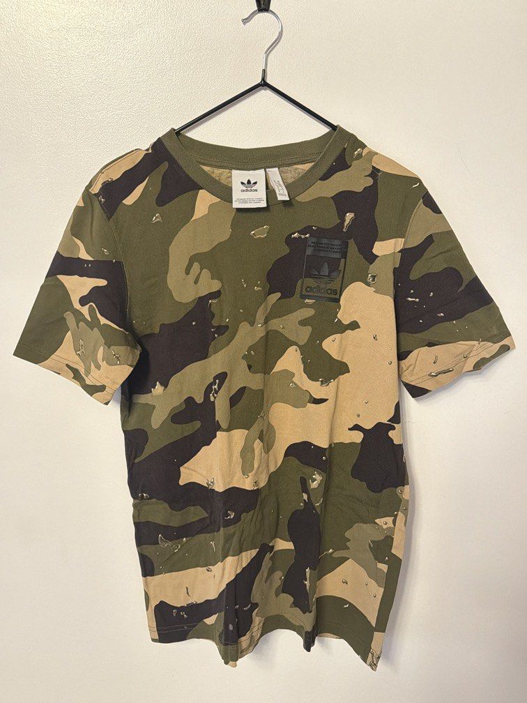 Adidas Camo Top (Category: Others Tops) located in Makati City. Submitted by prelovedandlovedbyt (Listing ID 1465046615, Image 1). Description: Unisex Authentic Can fit XS-MEDIUM.