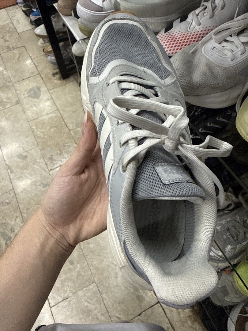 Adidas Grey White Chunky Sneakers (Category: Sneakers) located in Manila. Submitted by fastlion.584bdf (Listing ID 1465070795, Image 2). Description: - Brand: Adidas - Color: Grey and white with gum outsole - Style: Trendy chunky silhouette with white side stripes - Material: Breathable mesh and durable synthetic overlays - Features: Comfortable daily wear, secure lace-up front, and great traction pattern - Versatility: Neutral tones that easily 