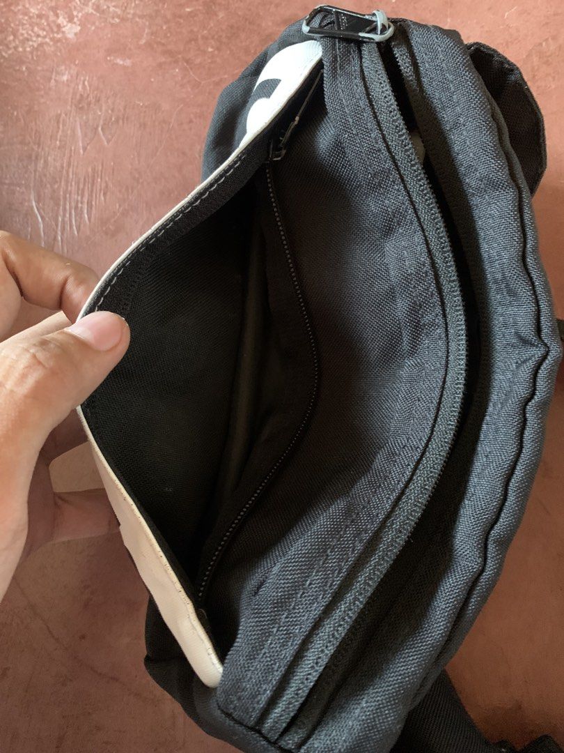 Adidas Linear Performance Waist Bag (Category: Belt bags, Clutches and Pouches) located in Legazpi City. Submitted by dreyydrey (Listing ID 1464994431, Image 3). Description: - Authentic black and white Adidas waist bag - Bold Adidas branding across the front panel - Adjustable strap with secure buckle closure - Spacious main zippered compartment with inner pocket - Made in Indonesia - Ideal everyday hands-free pouch for essentials.