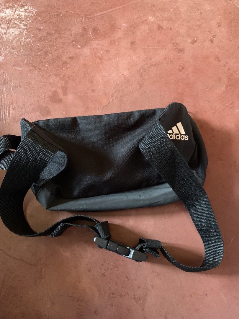 Adidas Linear Performance Waist Bag (Category: Belt bags, Clutches and Pouches) located in Legazpi City. Submitted by dreyydrey (Listing ID 1464994431, Image 2). Description: - Authentic black and white Adidas waist bag - Bold Adidas branding across the front panel - Adjustable strap with secure buckle closure - Spacious main zippered compartment with inner pocket - Made in Indonesia - Ideal everyday hands-free pouch for essentials.