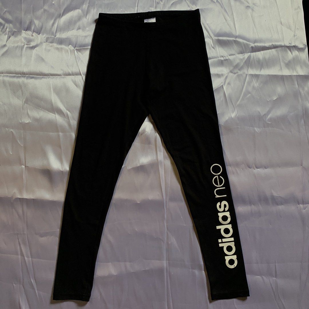 Adidas Neo Black Leggings (Category: Activewear) located in Rizal. Submitted by shop_ms.lai (Listing ID 1464972663, Image 1). Description: - Brand: Adidas Neo - Size: S/M - Color: Black with white logo down the left leg - Material: Cotton, polyester, and elastane blend for stretch - Condition: Good staple piece - Ideal for: Workouts or casual wear.