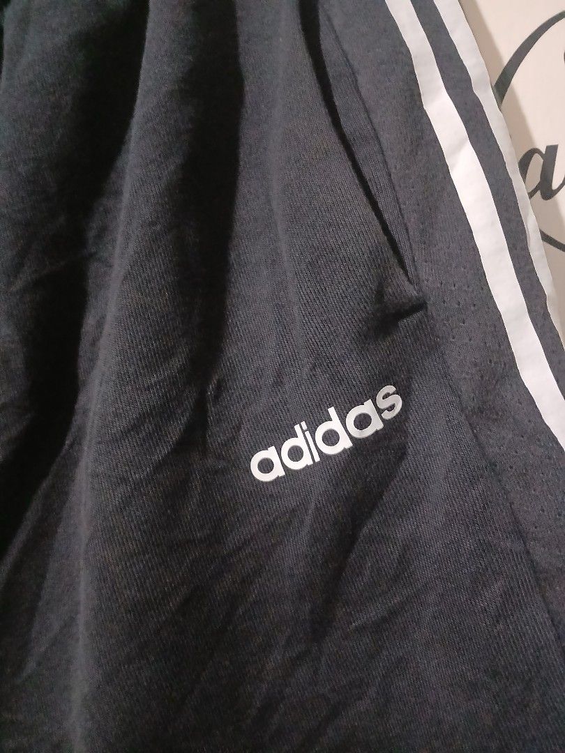 Adidas Neo Black Shorts 2XL (Category: Shorts) located in Caloocan City. Submitted by vincefresn21903 (Listing ID 1464993353, Image 2). Description: - Brand: Adidas Neo - Color: Black with white side stripes and printed logo - Size: A/2XL (185/96A) - Waistband: Comfortable elastic - Condition: Excellent - Best for: Workouts, lounging, or casual daily wear.
