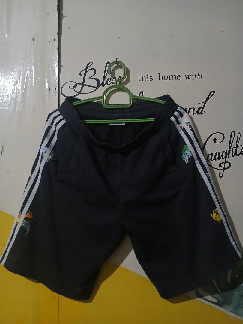 Adidas Neo Pokemon Shorts (Category: Shorts) located in Caloocan City. Submitted by vincefresn21903 (Listing ID 1464993495, Image 1). Description: - Brand: Adidas Neo - Color: Black with all-over Pokémon character print - Design: Classic 3 white stripes on both sides - Waistband: Comfortable elastic band - Condition: Brand new / Excellent (as applicable) - Perfect for: Casual wear, streetwear, and Pokémon fans - Send a message for inquiries or to