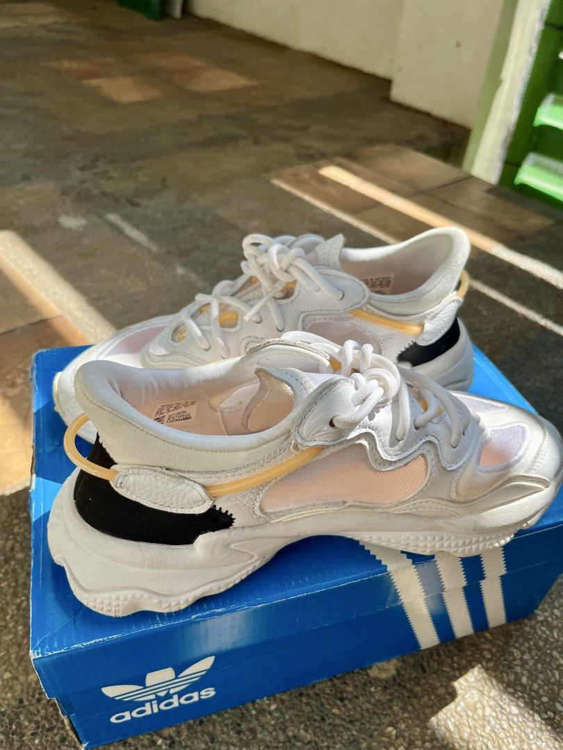 Adidas Ozweego Lite W (Category: Sneakers) located in Marikina City. Submitted by carmela_08 (Listing ID 1464980625, Image 3). Description: ADIDAS OZWEEGO LITE W (FX6295) RFS: Decluttering PHP 2,100 (negotiable) US 5.5 WOMEN (UK 4 | EUR 36 ⅔ | 22.5 CM) Item Details: • Condition: 9.5/10 (Lightly used 3x, original box included) • Colorway: Footwear White/Hazy Orange • Features: Lightweight mesh upper, Adiprene cushioning .