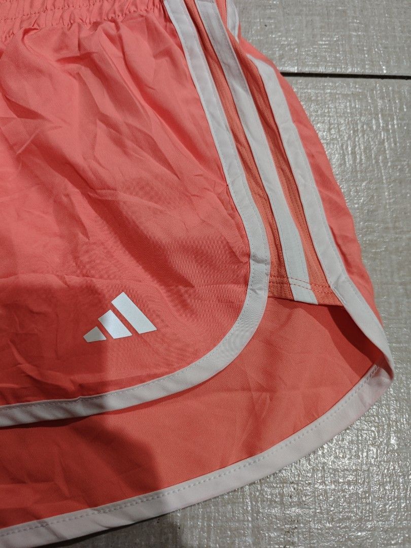 ADIDAS MARATHON 20 RUNNING SHORT (Category: Shorts) located in Manila. Submitted by lilianapat52117 (Listing ID 1465117410, Image 3). Description: ADIDAS MARATHON 20 RUNNING SHORT W/ INNER LINING ORANGE MEDIUM WAIST 31-34+ LENGTH 10½ EUC NO ISSUES 350.