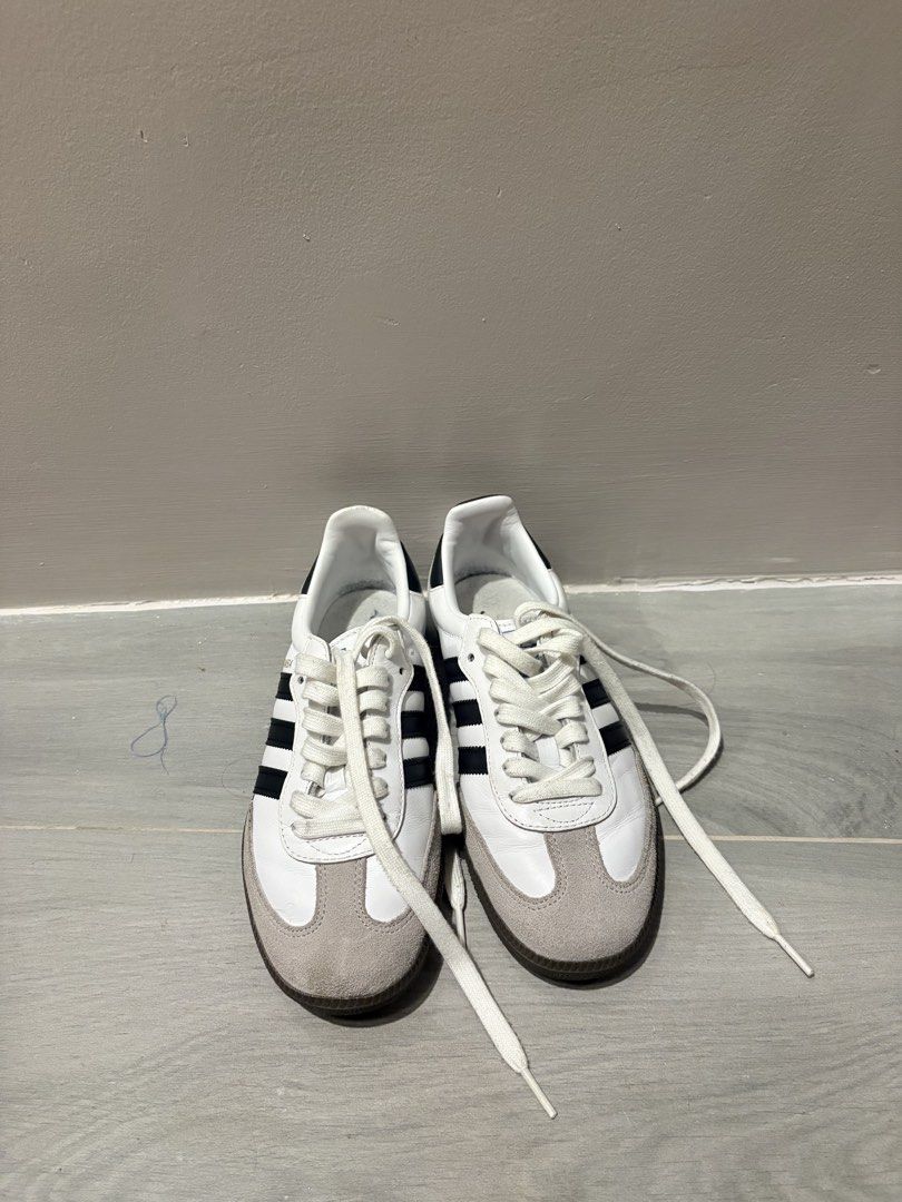 Adidas Samba OG White Black Gum (Category: Sneakers) located in Dasmarinas. Submitted by the_zoneshop.ph (Listing ID 1465122598, Image 1). Description: - White and black Adidas Samba sneakers with classic gum soles. - Iconic low-top silhouette featuring suede toe overlays and serrated three stripes. - Great everyday streetwear staple. - Used less than 10x - Size 6W.