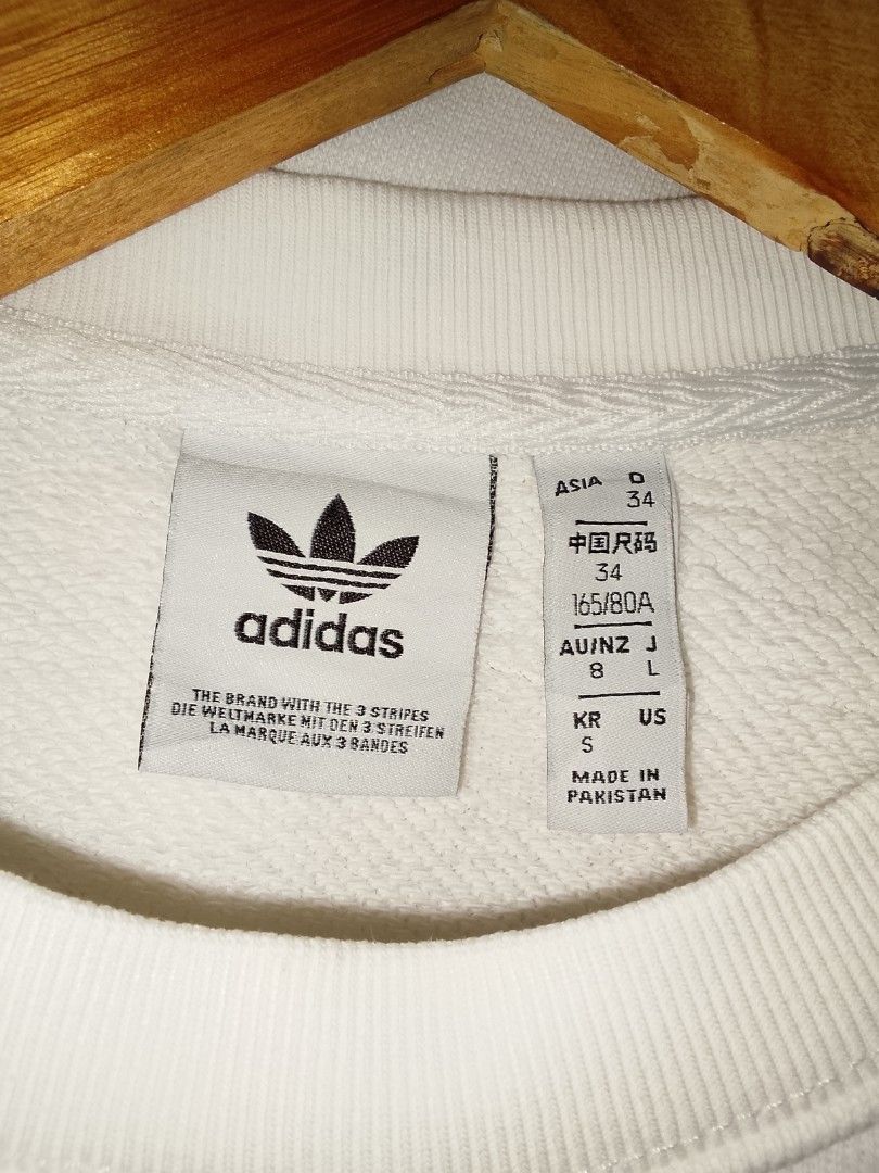 Adidas Sweater (Category: Hoodies) located in Dasmarinas. Submitted by alexander24 (Listing ID 1465111916, Image 2). Description: Adidas Sweater Size: Medium Dimes: W20 x L28 Condition: excellent Color rate: 9.8/10 Issue: Need wash.