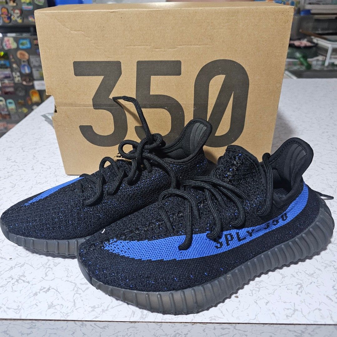 Adidas Yeezy Boost 350 V2 Dazzling Blue (Category: Sneakers) located in Mandaluyong City. Submitted by unishia21 (Listing ID 1465091778, Image 3). Description: - Brand: Adidas Yeezy Boost 350 V2 - Colorway: Core Black / Dazzling Blue - Size: US 5.5 / UK 5 - Details: Features the iconic SPLY-350 text along the side stripe - Inclusions: Original shoe box included - Condition: Brand new / Pristine condition (ready to ship or meet-up in PH).