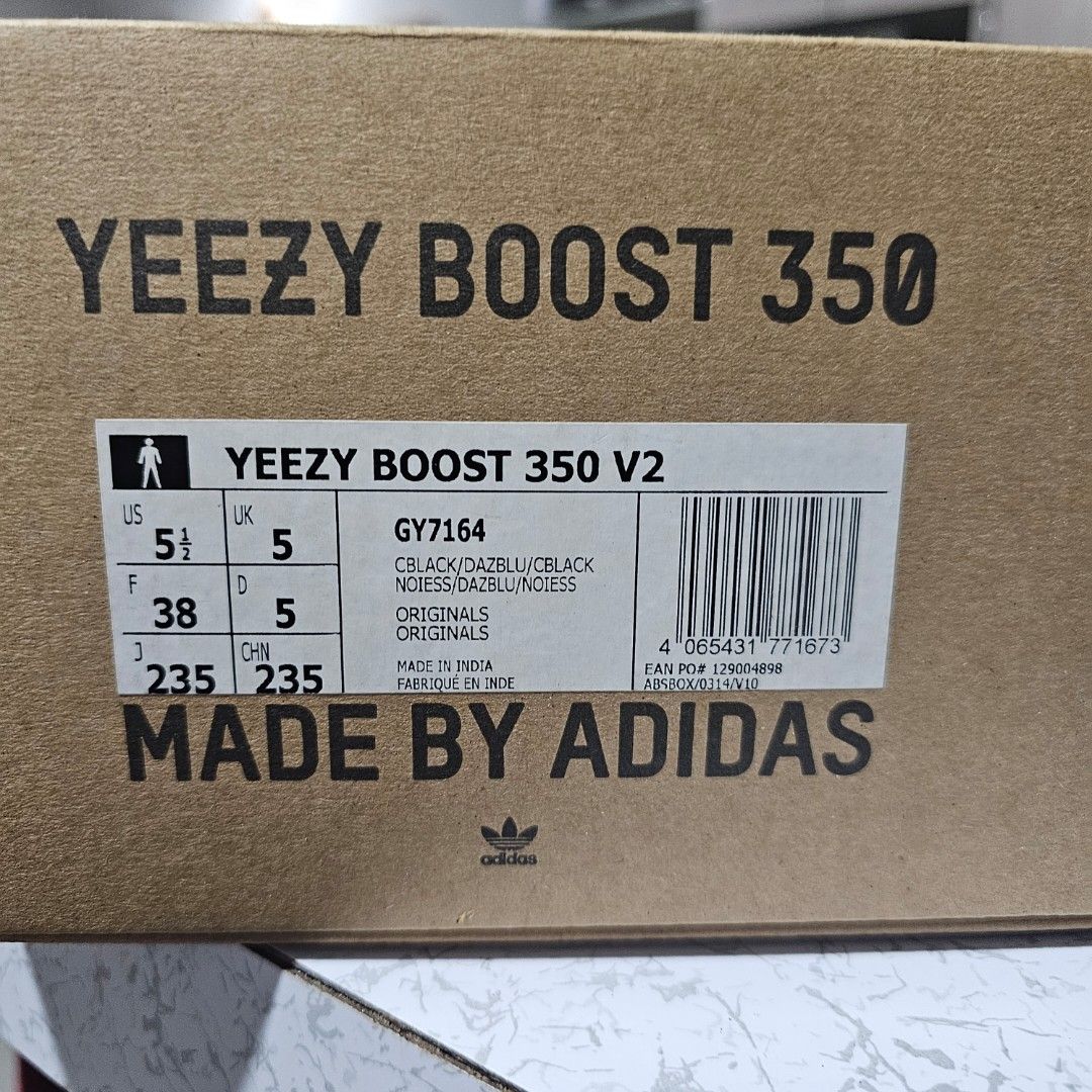 Adidas Yeezy Boost 350 V2 Dazzling Blue (Category: Sneakers) located in Mandaluyong City. Submitted by unishia21 (Listing ID 1465091778, Image 2). Description: - Brand: Adidas Yeezy Boost 350 V2 - Colorway: Core Black / Dazzling Blue - Size: US 5.5 / UK 5 - Details: Features the iconic SPLY-350 text along the side stripe - Inclusions: Original shoe box included - Condition: Brand new / Pristine condition (ready to ship or meet-up in PH).