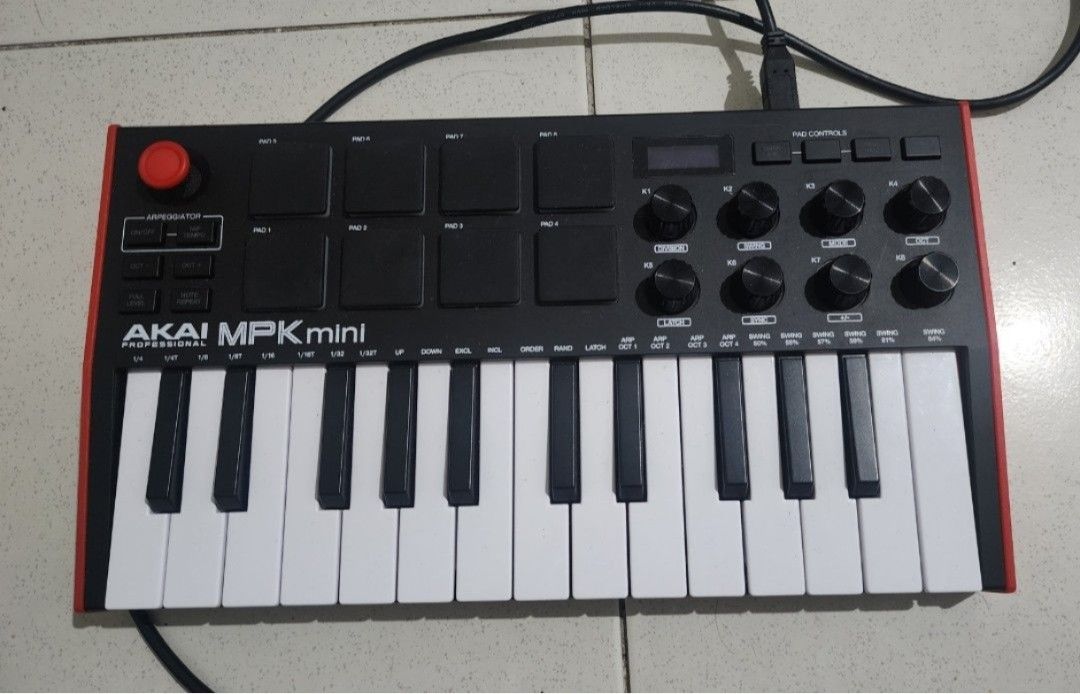Akai MPK mini USB MIDI Keyboard Controller (Category: Computer Keyboard) located in Caloocan City. Submitted by crayyyyy (Listing ID 1465161566, Image 1). Description: - Model: Akai MPK mini mk3 controller (Classic Black and Red) - Keys: 25 velocity-sensitive keys - Controls: 8 backlit pads and 8 assignable knobs - Connectivity: Includes USB cable, plug and play setup - Portability: Compact layout that fits easily on any desk - Ideal for: Making 