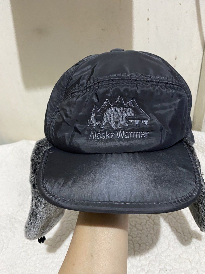 Alaska Warmer Winter Trapper Hat Ear Flaps Black (Category: Caps & Hats) located in Manila. Submitted by resi.diaz (Listing ID 1465040519, Image 2). Description: - Color: Black - Design: Embroidered bear and mountain landscape on front - Warmth: Super cozy furry ear flaps and soft fleece lining - Shell: Durable and sturdy nylon outer shell - Fit: Snap buttons to secure flaps up/down and adjustable elastic drawcord toggle in the back - Perfect for