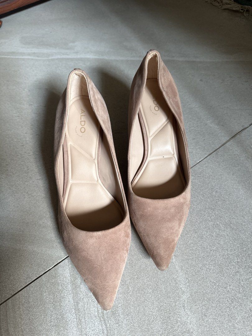 ALDO Pillow Walk Nude Suede Heels (Category: Heels) located in Muntinlupa City. Submitted by stuffbya (Listing ID 1464972274, Image 1). Description: - Brand: ALDO - Style: Pointed toe stiletto pumps - Color: Neutral nude - Material: Suede upper - Comfort: Pillow Walk cushioning for all-day wear - Condition: Excellent, clean insoles and very minimal outsole wear - Versatility: Perfect for office wear, formal dresses, or dressed-down denim.