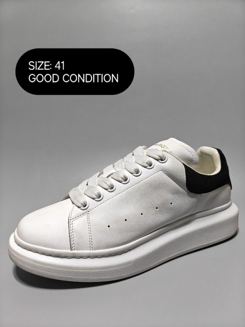 Alexander McQueen Oversized Sneaker (Category: Sneakers) located in Manila. Submitted by baguiogirlyy (Listing ID 1465096046, Image 1). Description: - Color: Classic white with black heel counters - Style: Trendy chunky platform silhouette with wide laces - Condition: Clean uppers, very minimal wear on the tread - Versatility: Great everyday kicks that match any outfit - Shipping: Fast shipping or meet-ups available - Note: Feel free to send a me